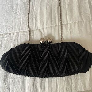 Black satin like evening purse.